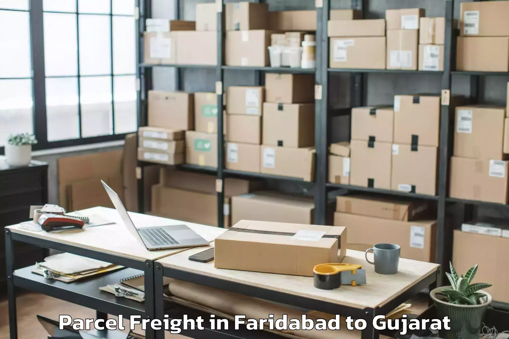 Book Faridabad to Keshod Airport Ixk Parcel Freight